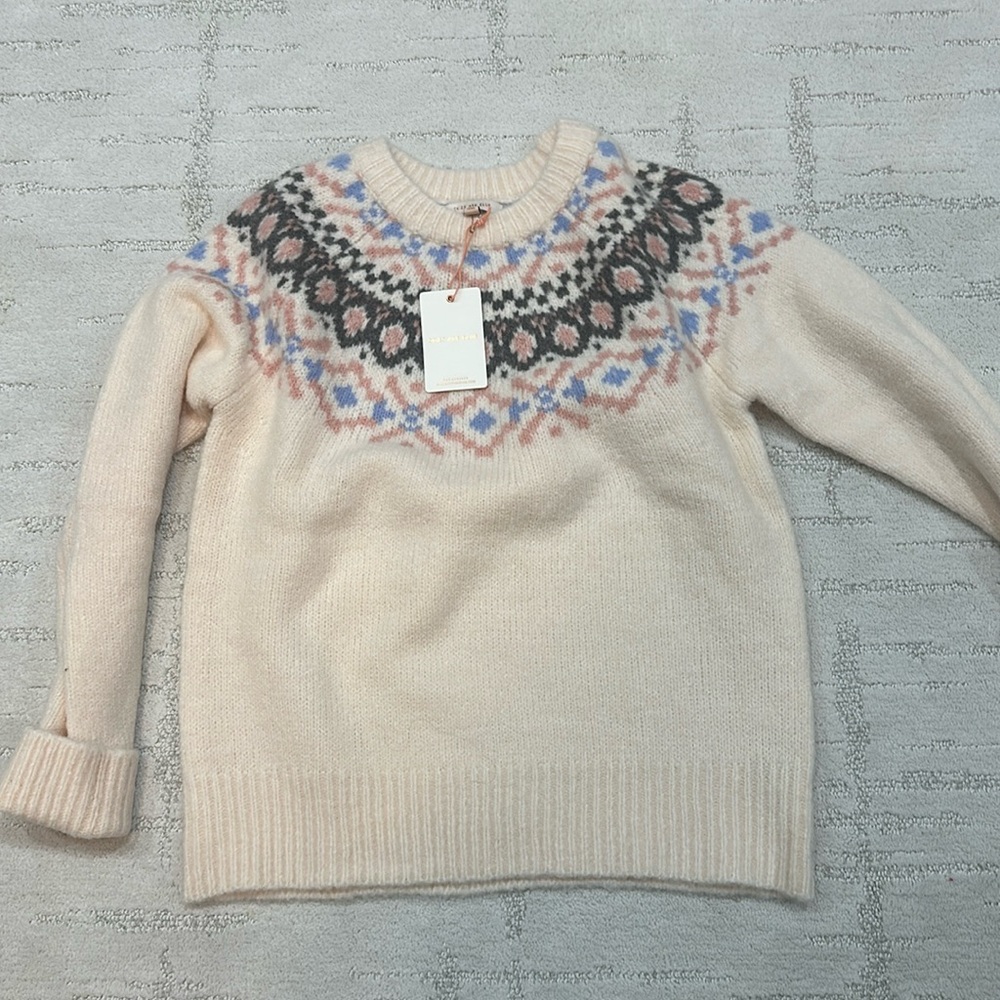 Skies are blue womens beige sweater with multi color design.